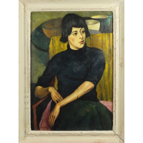 2114 - Portrait of a female in an interior, oil on canvas, bearing a signature Wolmark, mounted and framed,... 