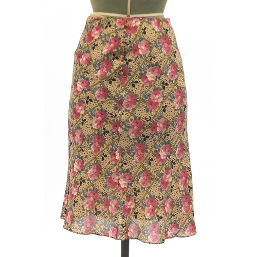 2252 - Chanel cashmere cardigan and two skirts comprising Chanel and Christian Dior, The Dior skirt size 8