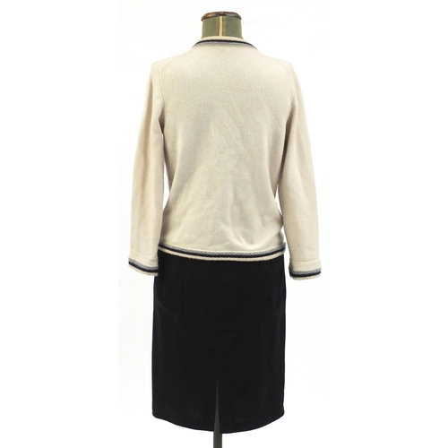 2252 - Chanel cashmere cardigan and two skirts comprising Chanel and Christian Dior, The Dior skirt size 8