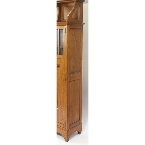 2003 - Arts & Crafts oak breakfront cabinet by Koloman Moser, with Viennese inlay, mirrored back and brass ... 