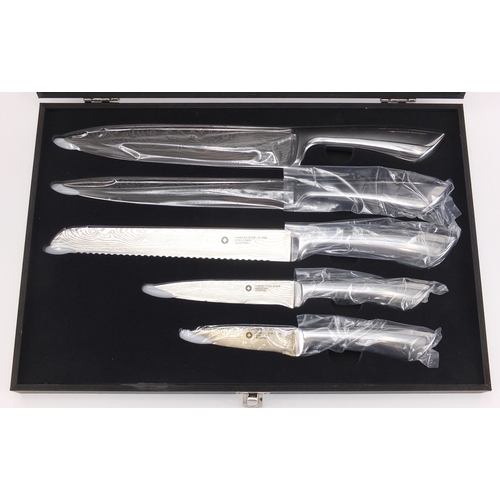 2166 - As new Swiss five piece knife set, with Damask steel blades and fitted case