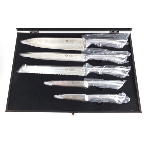 2167 - As new Swiss five piece knife set, with Damask steel blades and fitted case