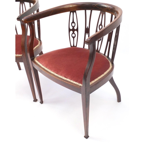 2132 - Pair of inlaid mahogany tub chairs, with pink upholstered stuff over seats, 73cm high