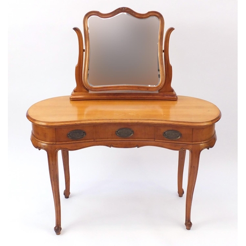 44 - French pitch pine and walnut kidney shaped dressing table, with mirrored back fitted with three draw... 