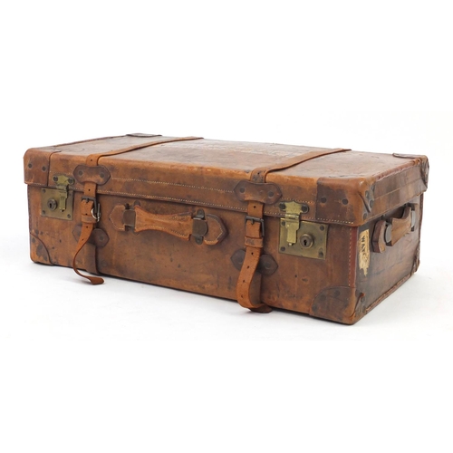 28 - Vintage tan leather suitcase, with remnants of Southern Railway paper labels, 77cm wide