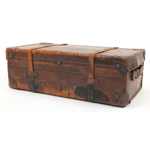 28 - Vintage tan leather suitcase, with remnants of Southern Railway paper labels, 77cm wide
