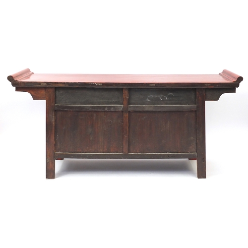 59 - Chinese red lacquered altar sideboard, fitted with three drawers above a pair of cupboard doors, 87c... 