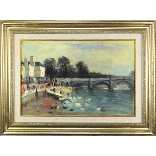 61 - Children feeding swans before a bridge, oil on canvas board, bearing a signature Wesson, mounted and... 