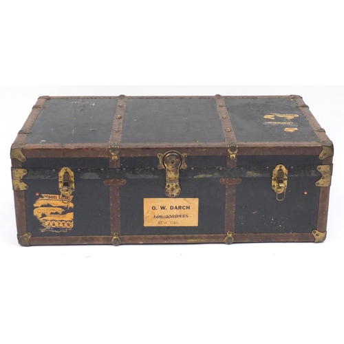 6 - Vintage leather and brass bound trunk, with remnants of shipping labels, 35cm H x 103cm W x 57cm D