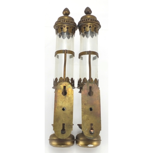 2274 - Pair of GWR brass candle holders with glass shades, each 38cm high