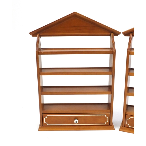 54 - Pair of light wood hanging shelves, each fitted with a drawer to the base, 57cm H x 38cm W x 10cm D