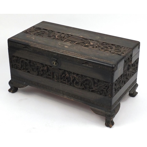 9 - Chinese camphorwood trunk carved with dragons and pagodas, 49cm H x 90cm W x 48cm D