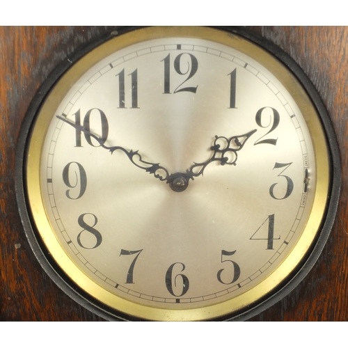 87 - Oak long case clock, with silvered dial, 194cm high