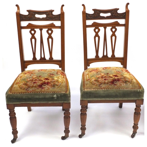 24 - Set of four carved walnut dining chairs with green stuff over seats, 100cm high