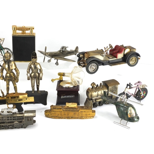 2315 - Vintage and later novelty table lighters including two Knights, train and helicopter design examples