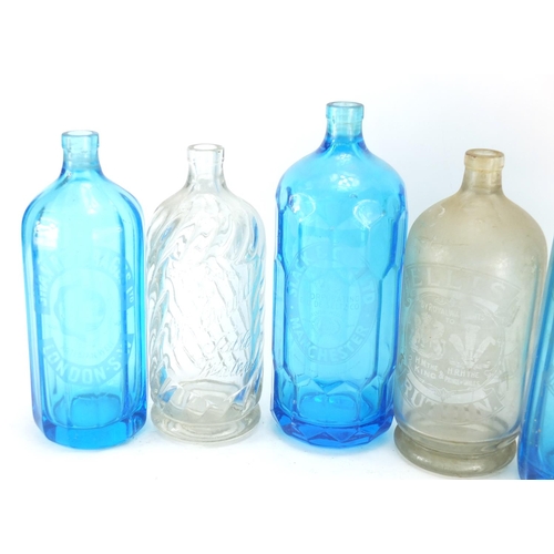 2104 - Six vintage advertising soda syphon bottles including Ellis's, H Gould's, Bolingbroke Aerated and Sw... 