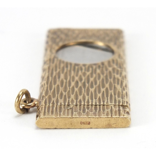 2573 - 9ct gold cigar cutter with suspension loop, 5.5cm in length, approximate weight 22.0g