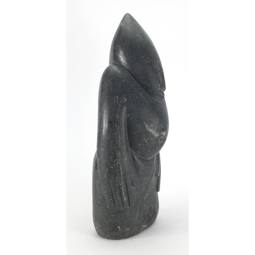 2045 - Inuit style modernist figural stone carving, signed P Fredy, 50cm high