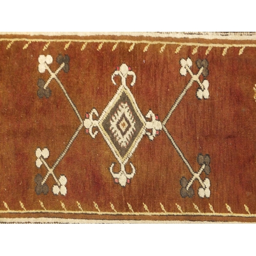 13 - Rectangular Turkish rug, with all over geometric pattern, 213cm x 118cm