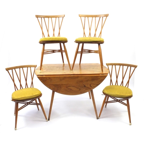 6 - Ercol elm drop leaf table and four candlestick dining chairs, each chair 80cm high