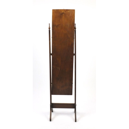 52 - Oak cheval mirror with bevelled glass, 154cm high