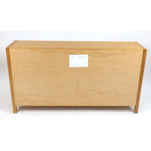 12 - Modern light wood sideboard, fitted with five drawers and a pair of cupboard doors, 86cm H x 159cm W... 
