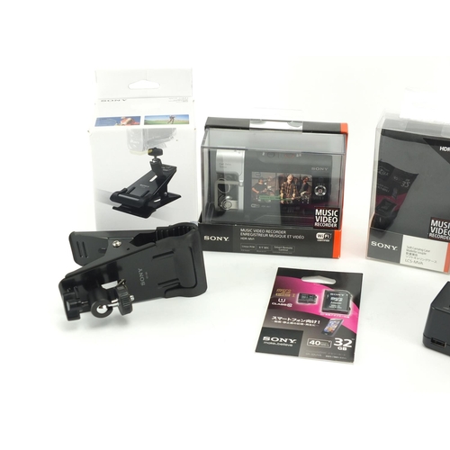 2460 - Sony HDR-MV1 music video recorder and accessories, all boxed