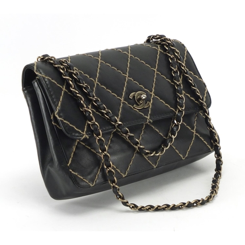 2426 - Chanel Surpique leather flap bag with dust bag, serial number 6131411, 25.5cm wide