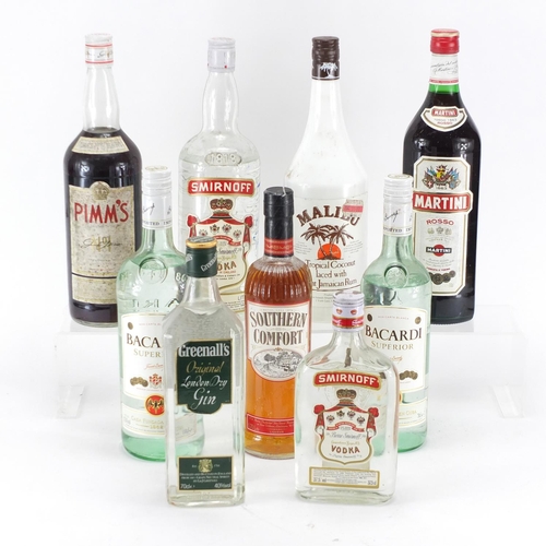 2309 - Nine bottles of spirits including Southern Comfort, Bacardi, Greenall's gin and Smirnoff vodka