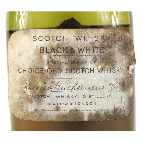 2289 - Bottle of Black and White Scotch Whisky
