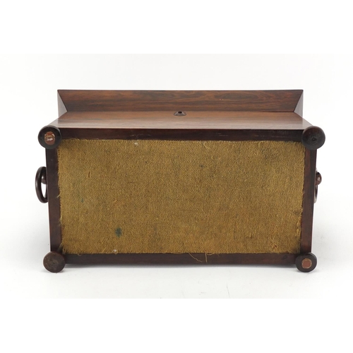 2070 - Victorian rosewood sarcophagus shaped tea caddy, with ring turned handles and fitted interior, 22cm ... 
