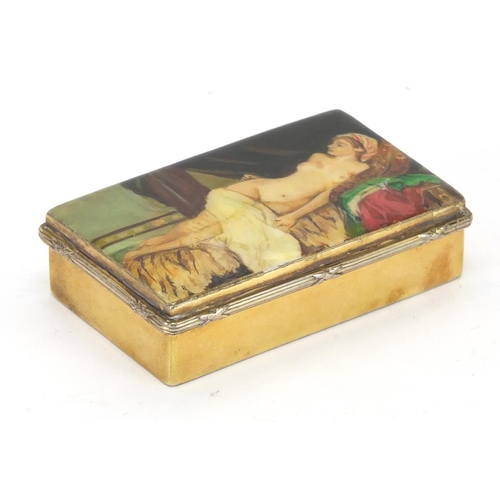 2474 - Rectangular silver gilt box and cover, the lid decorated with a reclining nude female, retailed by A... 