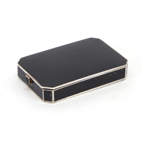 2485 - Rectangular continental silver and black enamel compact, impressed marks to the interior, 7cm wide, ... 
