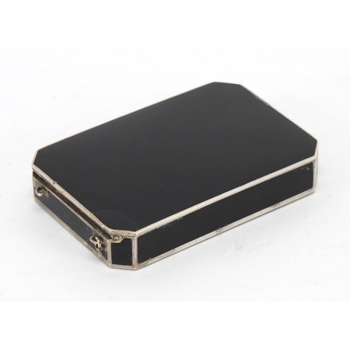 2485 - Rectangular continental silver and black enamel compact, impressed marks to the interior, 7cm wide, ... 