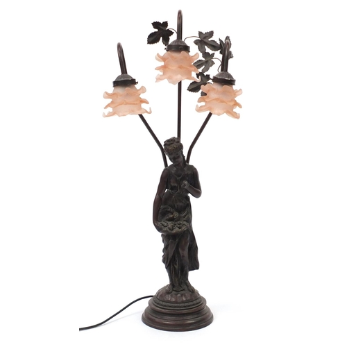 2220 - Art Nouveau style three branch figural table lamp with frilled frosted peach glass shades, 84cm high