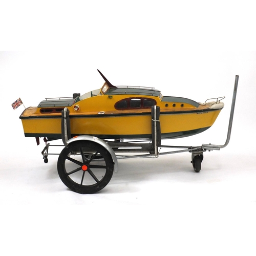 2389 - Large electric remote control speed boat - Sea Queen with transport trolley, 110cm in length