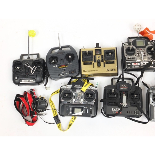 2421 - Nine vehicle remote controls including Futaba, Spektrum and Acoms