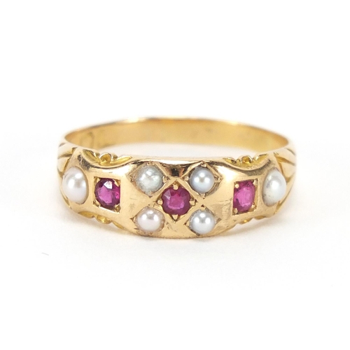 2645 - Victorian gold garnet and seed pearl ring, indistinct hallmarks, size Q, approximate weight 3.6g