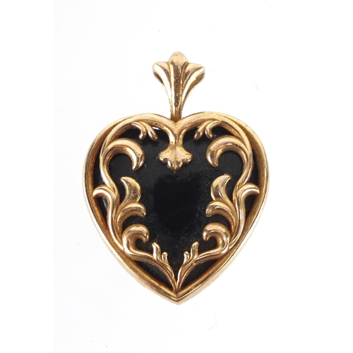 2651 - 10ct gold black enamel love heart pendant, 2.2cm in length, approximate weight 4.2g