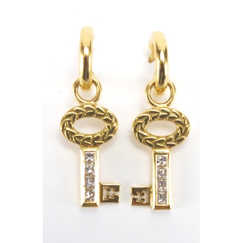 2604 - Pair of 18ct gold and diamond key design earrings by Theo Fennell, 3cm in length, approximate weight... 