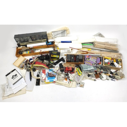 2420 - Extensive collection of aeroplane and boat model making paints and accessories including balsa wood,... 