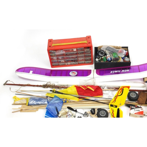 2420 - Extensive collection of aeroplane and boat model making paints and accessories including balsa wood,... 
