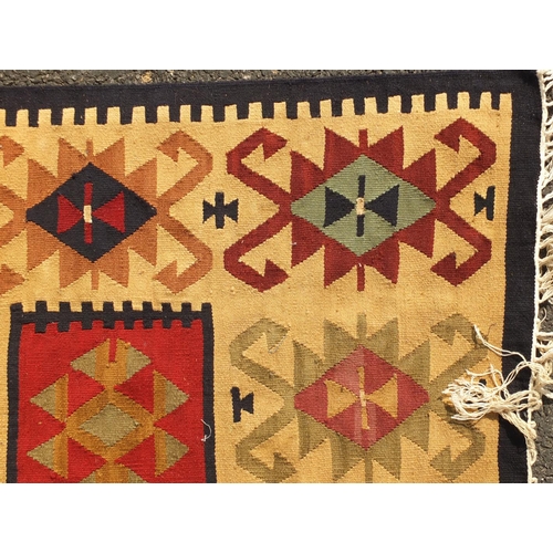 2020 - Turkish Kilim rug, having an all over stylised design onto a predominantly beige ground, 225cm x 157... 