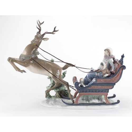 2061 - Large Lladro figure group, Winter Wonderland with figures in a reindeer sledge, numbered 1429, 54cm ... 