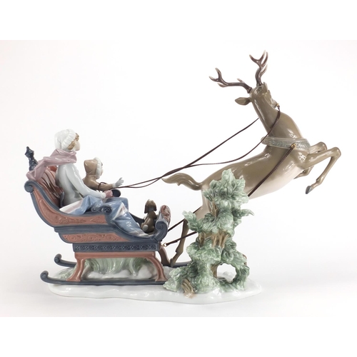 2061 - Large Lladro figure group, Winter Wonderland with figures in a reindeer sledge, numbered 1429, 54cm ... 