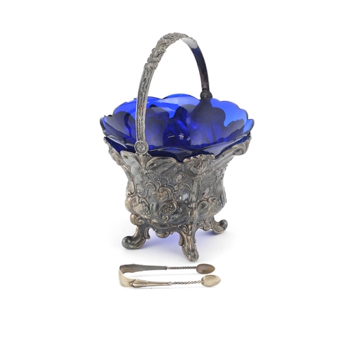 2502 - French silver basket embossed with flowers, with swing handle and blue glass liner, indistinct impre... 