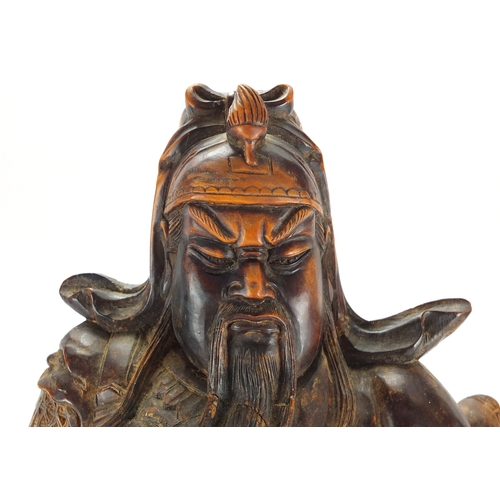 2064 - Large Chinese hardwood carving of a warrior wearing a robe, depicting a dragon amongst clouds chasin... 