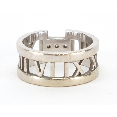 2615 - Tiffany & Co 18ct white gold diamond ring, with Roman numeral band, size M, approximate weight 7.1g