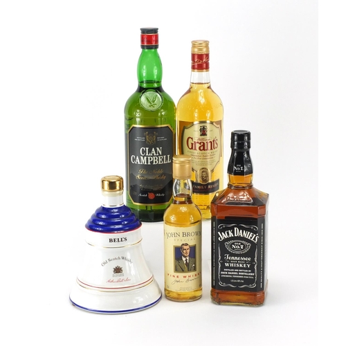 2311 - Five bottles of whisky, Bell's housed in a commemorative Princess Eugenie decanter, Jack Daniels, Gr... 
