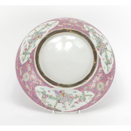 2179 - Chinese porcelain shallow dish, hand painted in the famille rose palette with panels of figures in a... 